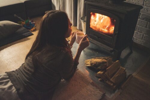 Woman indoor fire